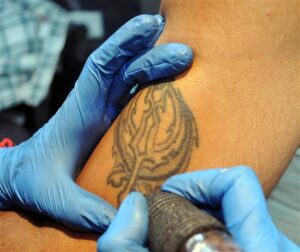 The SGPC warns against tattoos of Sikh religious symbols or Gurbani verses